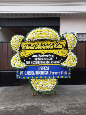 Papan Bunga Duka di Belo